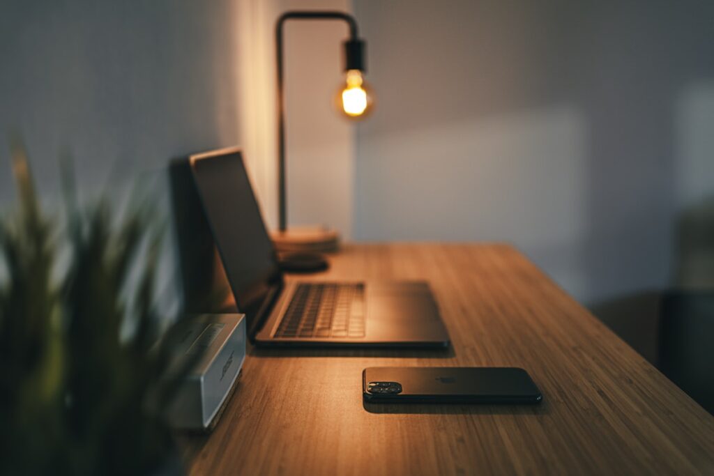Modern minimal workspace with executive leather desk mat and keyboard