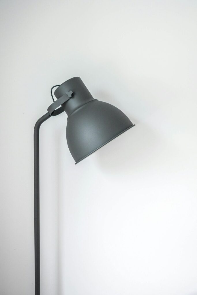 Warm 2700K ambient task lighting illuminating a modern workspace
